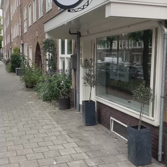 Gevelreclame die draait voor Dutch Real Estate Company